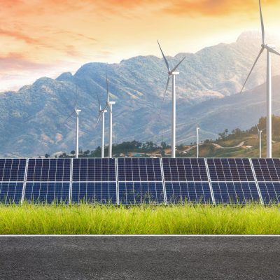 vecteezy_asphalt-road-with-solar-panels-with-wind-turbines-against_4876750